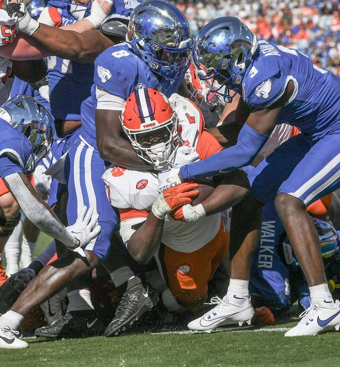 Clemson running back Phil Mafah (7) scores one of his four touchdowns against Kentucky in the TaxSlayer Gator Bowl.
