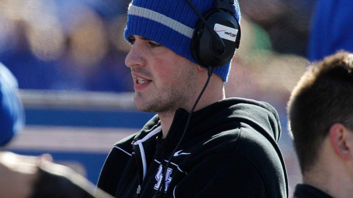 UK's Mike Hartline show in the sideline in the second quarter on Saturday, Jan. 8, 2011 during the  BBVA Compass Bowl, Kentucky vs. Pittsburgh, at Legion Field in Birmingham, Alabama.  Hartline, a QB, was suspended by head coach Joker Phillips for the bowl and was in street clothes.  Photo by David Perry | Staff