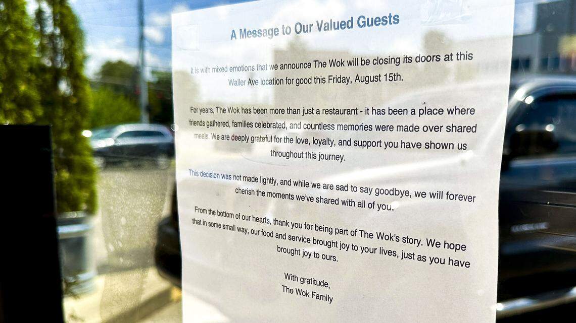 A sign on the front door of The Wok tells customers the longtime, popular Chinese restaurant is closing Aug. 15 after it negotiated a deal for another local Chinese restaurant to take over the lease at the Waller Avenue location.