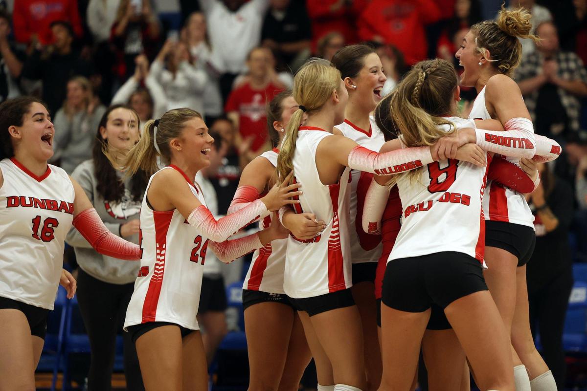 Paul Laurence Dunbar’s volleyball players celebrated after defeating Lexington Catholic in the 43rd District Tournament championship game at Lexington Christian Academy on Thursday.