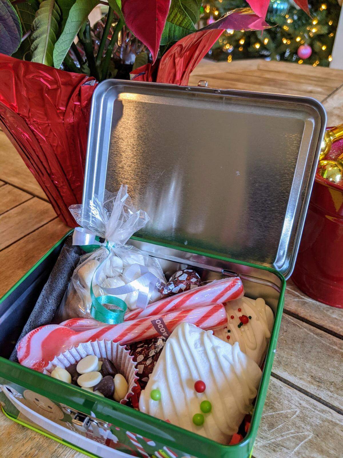 Selma’s Catering on Henry Clay Boulevard has hot chocolate tins available, and you can add on a cookie decorating kit.