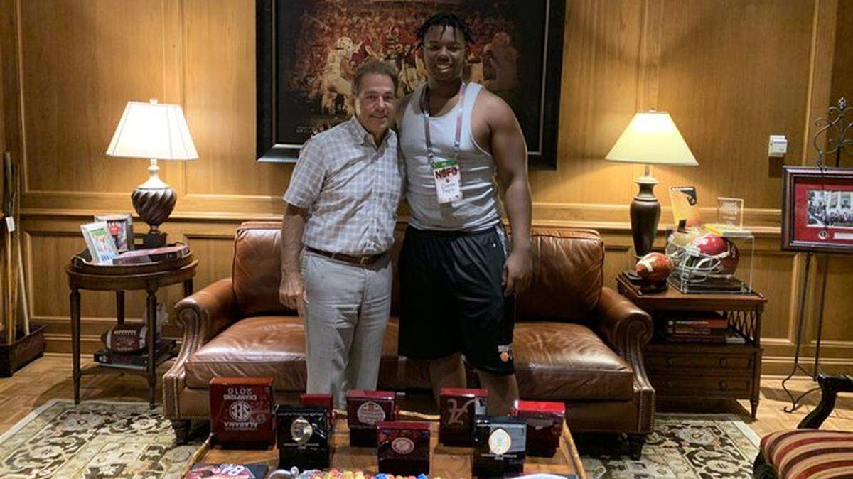 Damon Payne (right) shared this image of him and Alabama Coach Nick Saban, taken during a visit to Alabama in June 2019, on Twitter. Kentucky was a finalist in Payne’s recruitment, but on Sunday the star defensive tackle committed to Alabama.