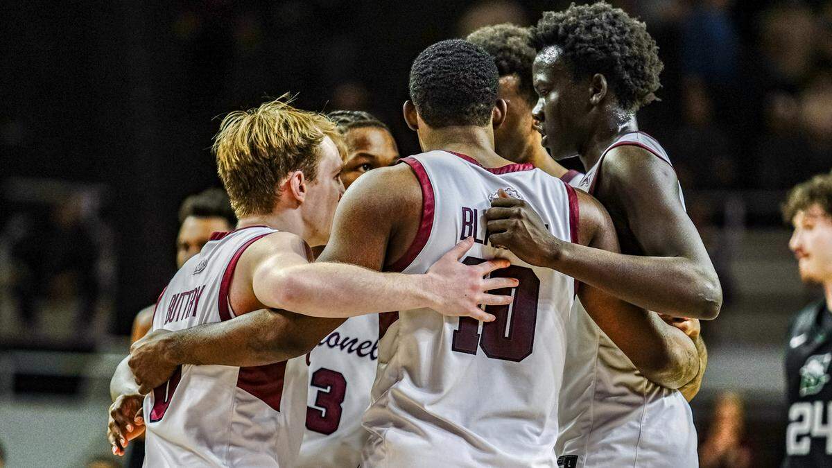 Members of the Eastern Kentucky men’s basketball team huddle during a game against Stetson on Jan. 23. The Colonels have won six straight games.