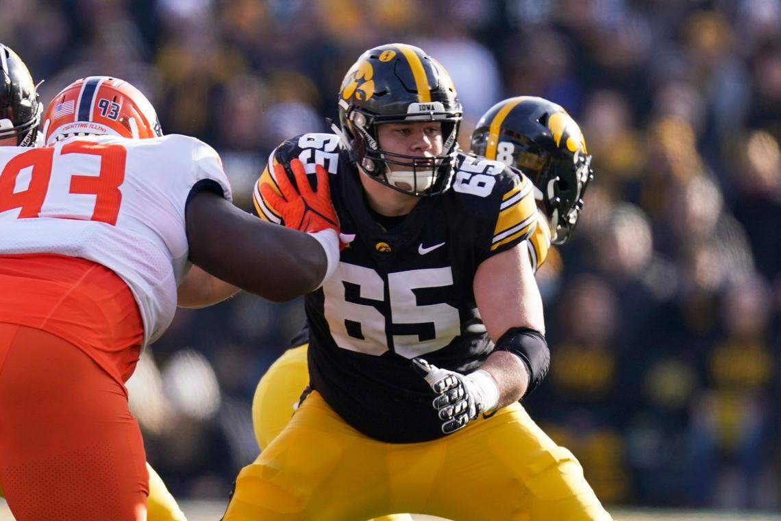 Iowa redshirt junior Tyler Linderbaum (65) won the Rimington Award signifying the nation’s best center.
