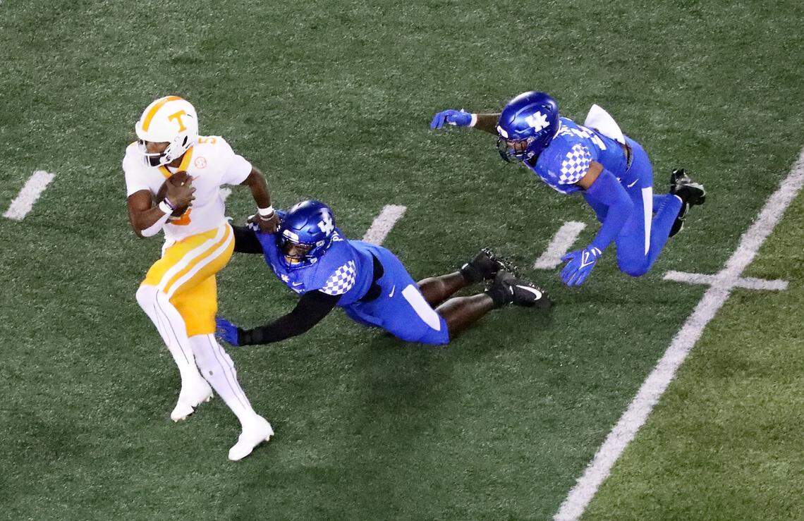 Tennessee quarterback Hendon Hooker (5) ran for 41 yards on 11 carries and threw for 316 yards and four touchdowns in the Volunteers’ 45-42 win over Kentucky last season at Kroger Field.
