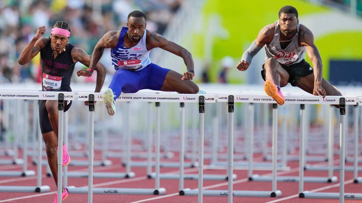 Former University of Kentucky star Daniel Roberts, center, wins the 110-meter hurdles at the U.S. Outdoor Track and Field Championships at Eugene, Ore., on Sunday night.