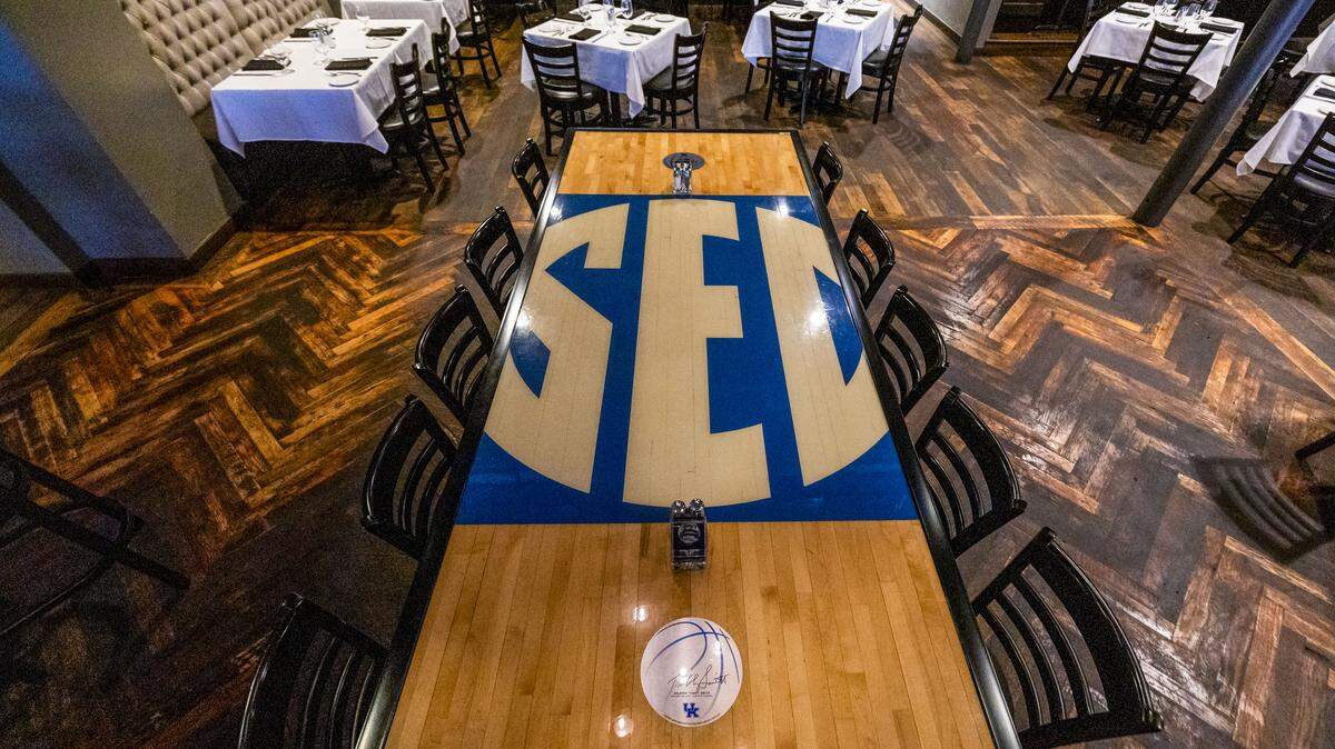 Downtown steakhouse Tony’s of Lexington has a table made from a Rupp Arena basketball court used by the University of Kentucky from 2001-2024. The specially-made table seats 12. Photographed Thursday, March 5, 2026 at in Lexington, Ky.