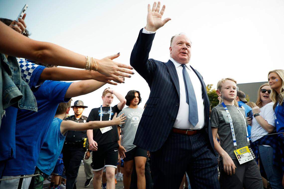 Kentucky head coach Mark Stoops greeted fans along the Cat Walk before Saturday’s 42-21 win against LSU.