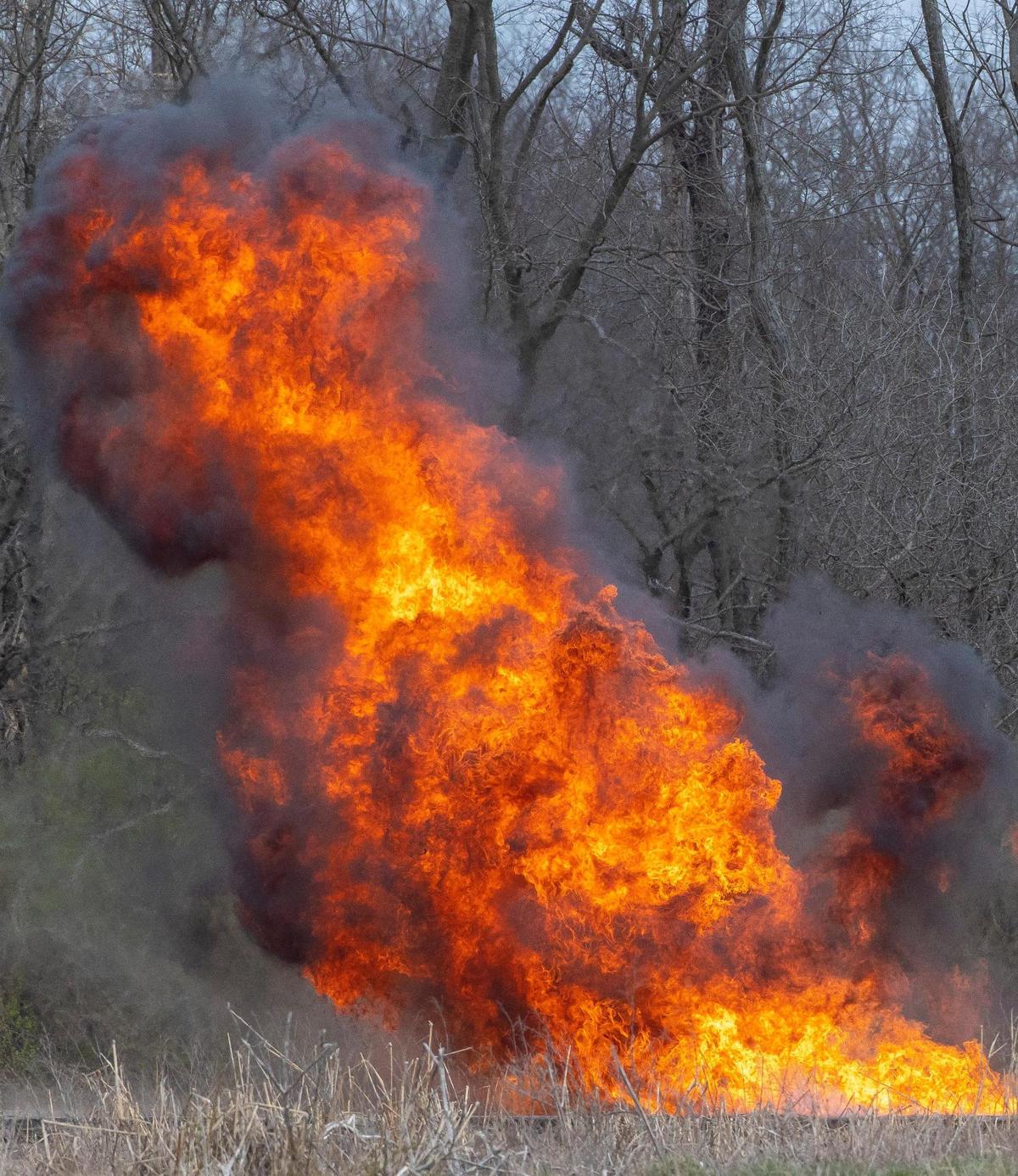 Members of the the Bureau of Alcohol, Tobacco, Firearms and Explosives Lexington field office conduct a disposal demonstration at the explosives disposal range in Fayette County, Ky., Wednesday, March 30, 2022.