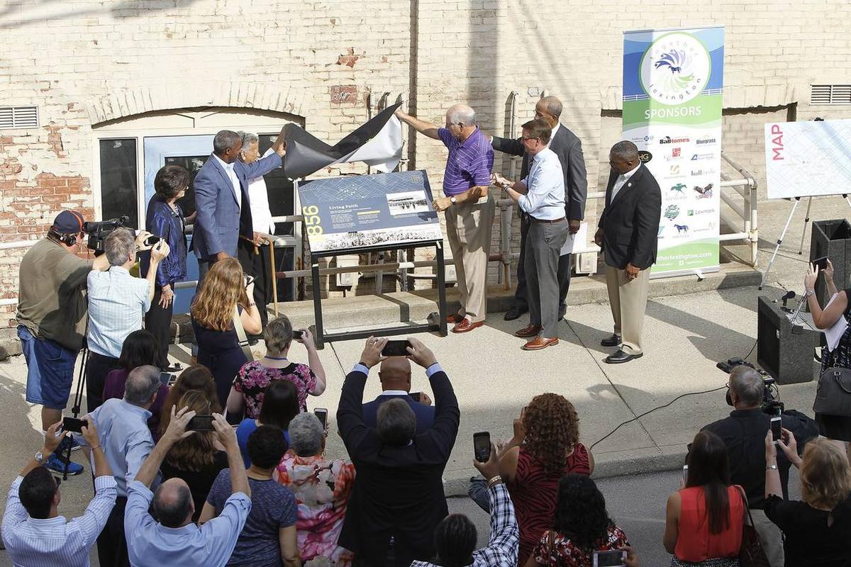 The first marker is unveiled at a press conference to announce the creation of the African-American Heritage Trail on DeWeese Street.