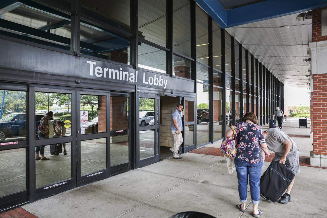 Travelers gather near the terminal at the Blue Grass Airport on Aug. 3, 2023 in this archived photo.