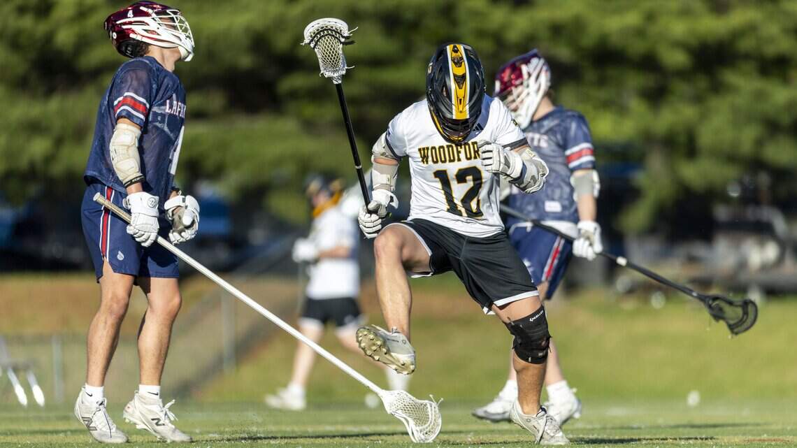 High school lacrosse: Woodford County rolls in district final to remain unbeaten