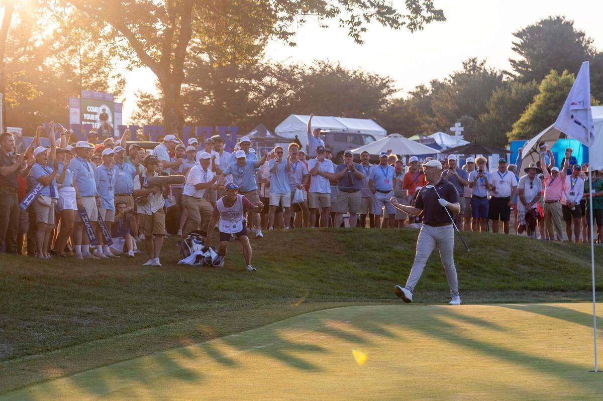 Harry Hall chips in for birdie on the 9th hole during a playoff during the final round of the 2024 ISCO Championship at Champions at Keene Trace Golf Club in Nicholasville, Ky., on Sunday, July 14, 2024. Hall recorded his first PGA Tour win after emerging from a five-man playoff.