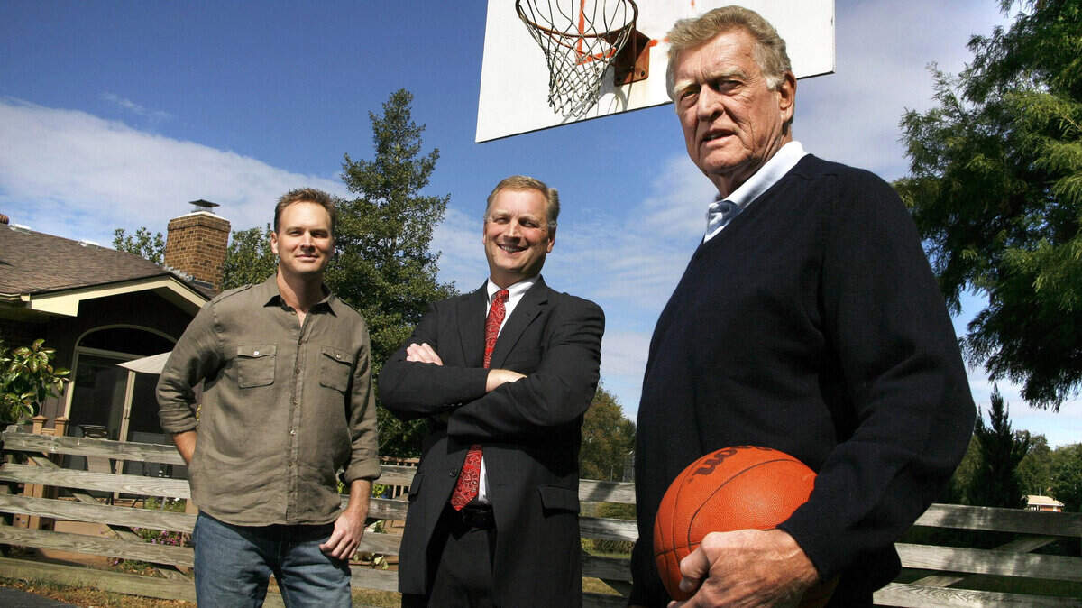 Cotton Nash, right, would play basketball with sons Richey, left, and Pat at this goal at their home in Lexington when the boys were growing up. Charles "Cotton" Nash was a UK All-America basketball player in the early 1960s.     