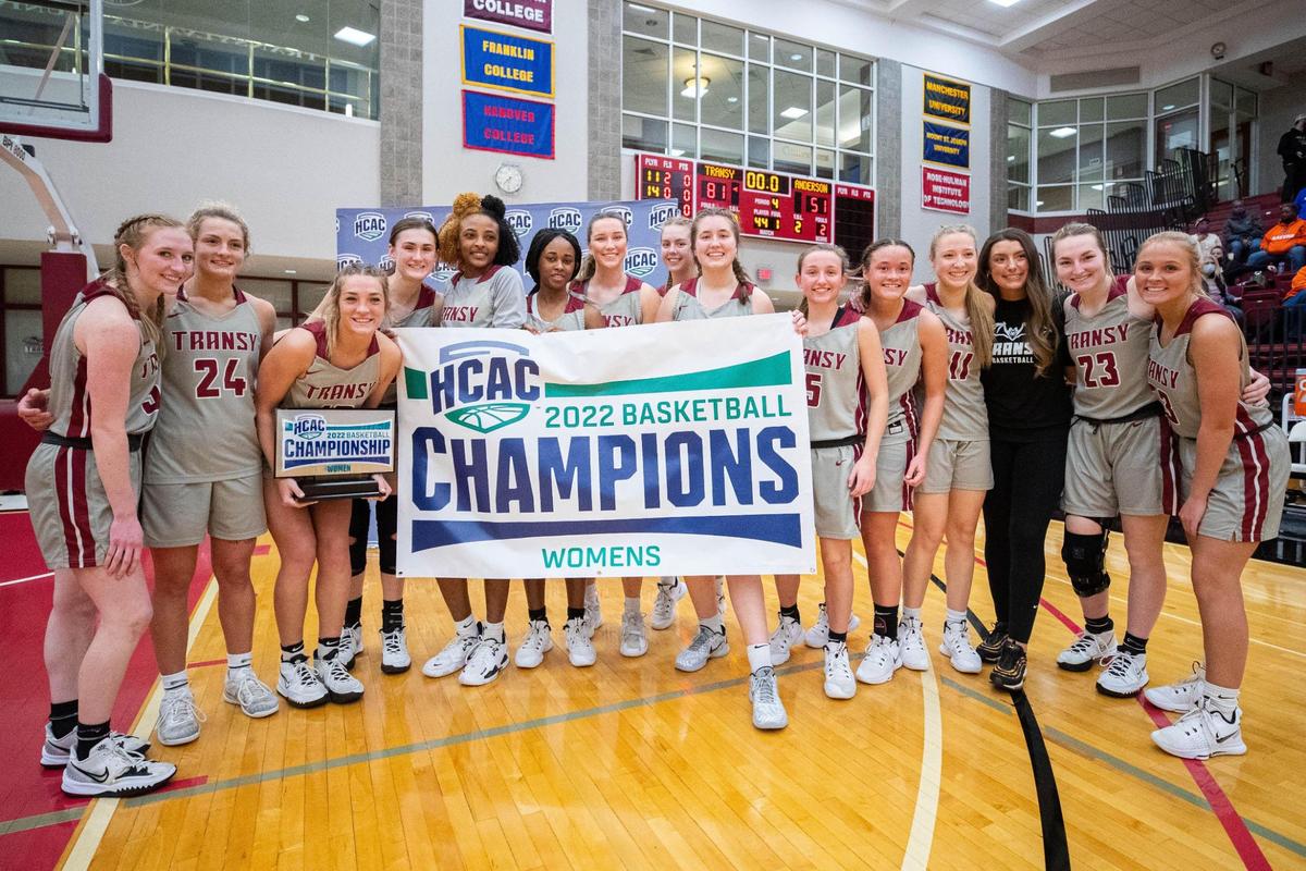 Transylvania poses with their trophy after defeating Anderson in the Heartland Collegiate Athletic Conference Tournament championship game on Saturday at the Beck Center.