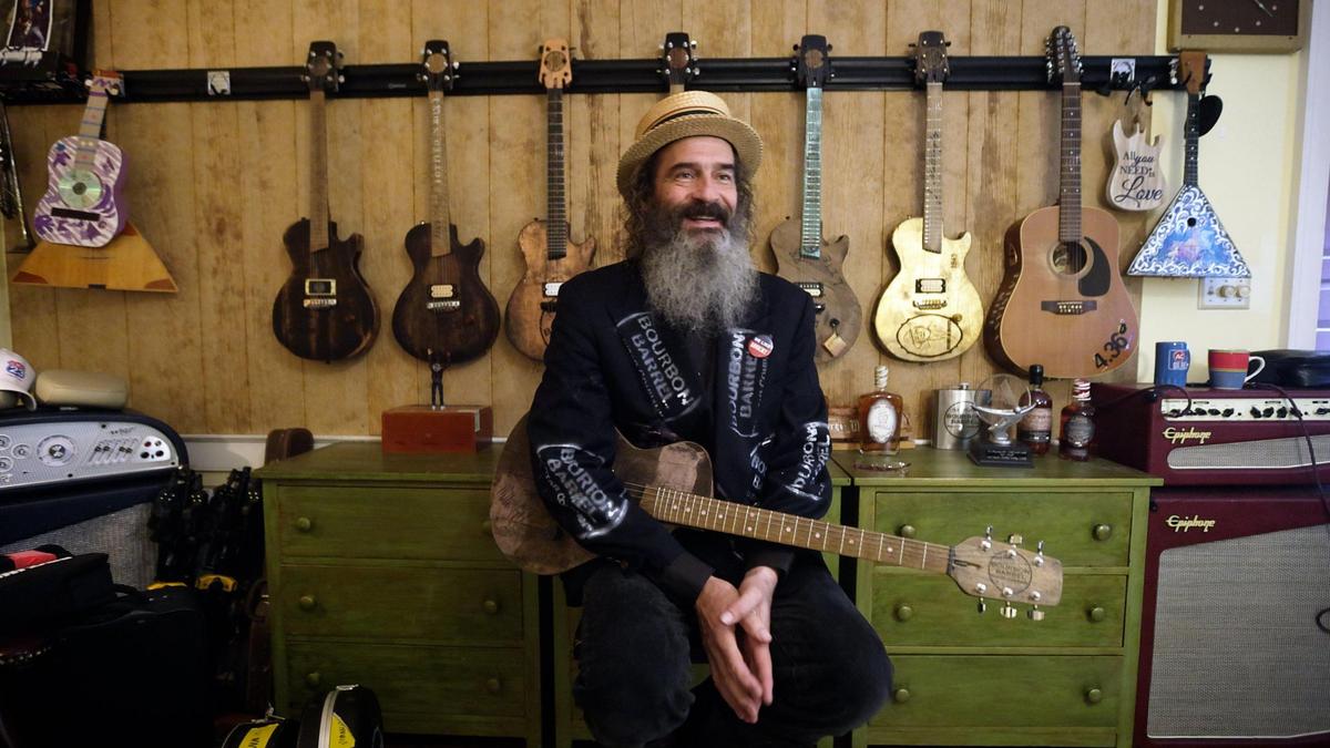 Mike Mankel, owner of Bourbon Barrel Guitars in Athens, has been crafting guitars for 30 years, and had started hand-crafting guitars out of various bourbon barrels for 6 years.