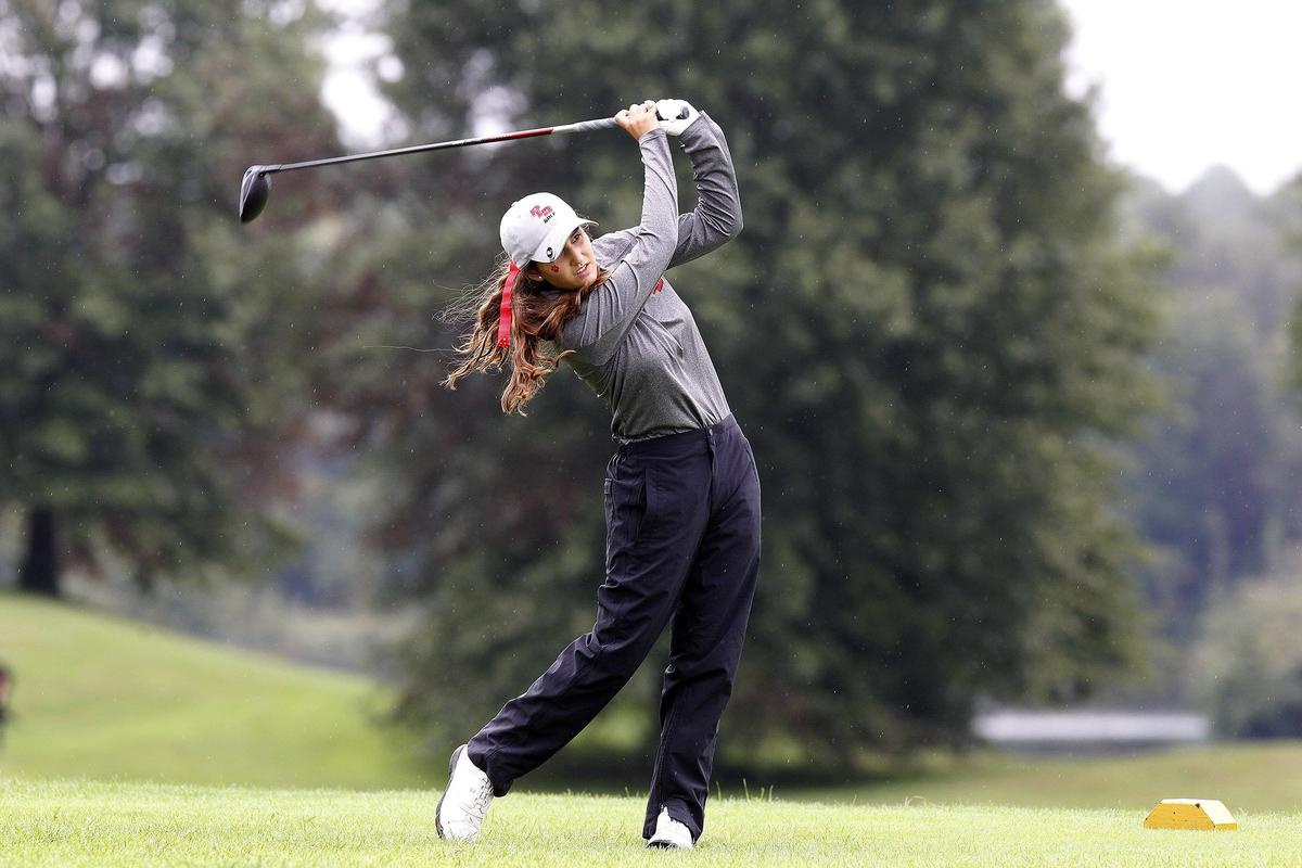 Paul Laurence Dunbar’s Maddie Cecil teed off Monday at the 7th Region girls’ golf tournament at Gibson Bay Golf Course in Richmond. The tournament took two days to complete because rain suspended play Monday.