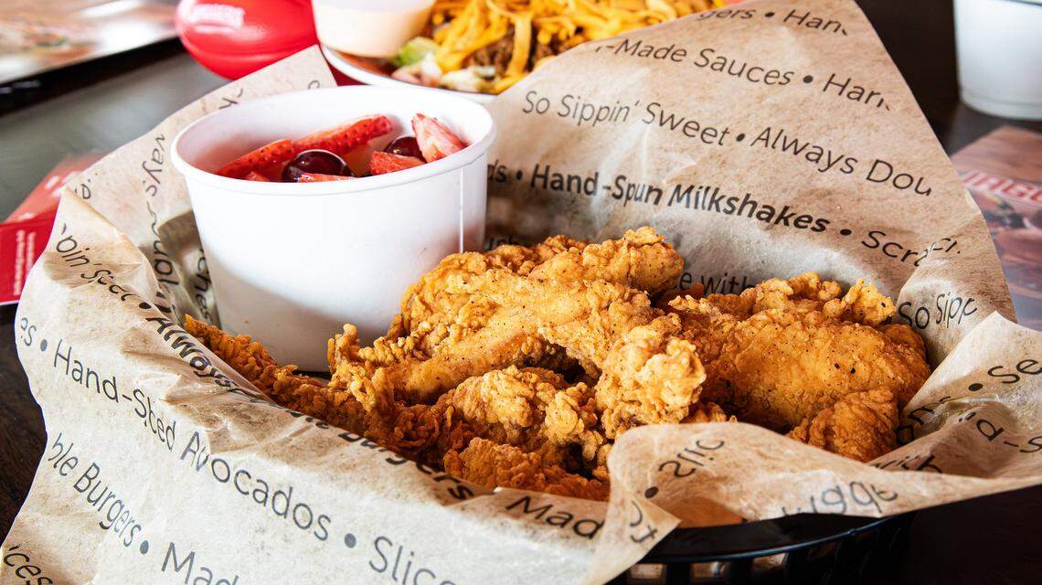 Freshly fried, golden chicken strips are complemented by a summer fruit cup that's made to order at the first Jaggers location on 2350 Norman Lane at Regency Center on August 5, 2025, in Lexington, KY.