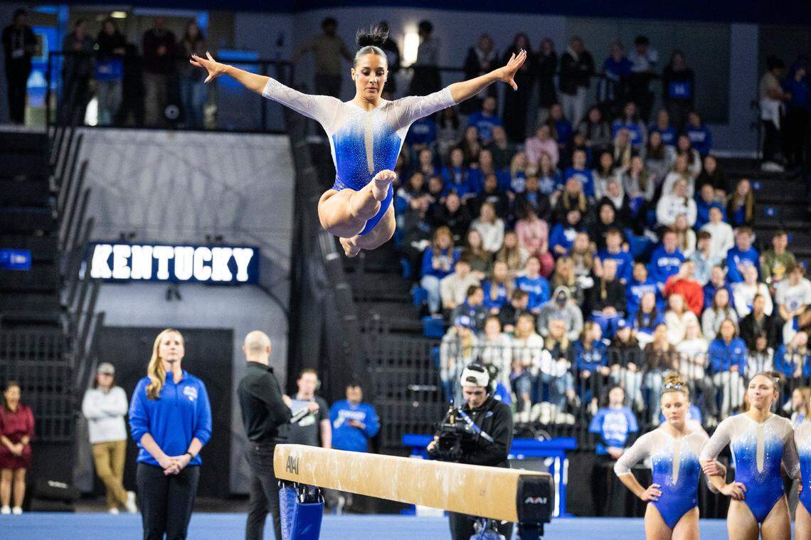 Kentucky’s Isabella Magnelli won the balance beam Friday night and also tied for first place in the vault.