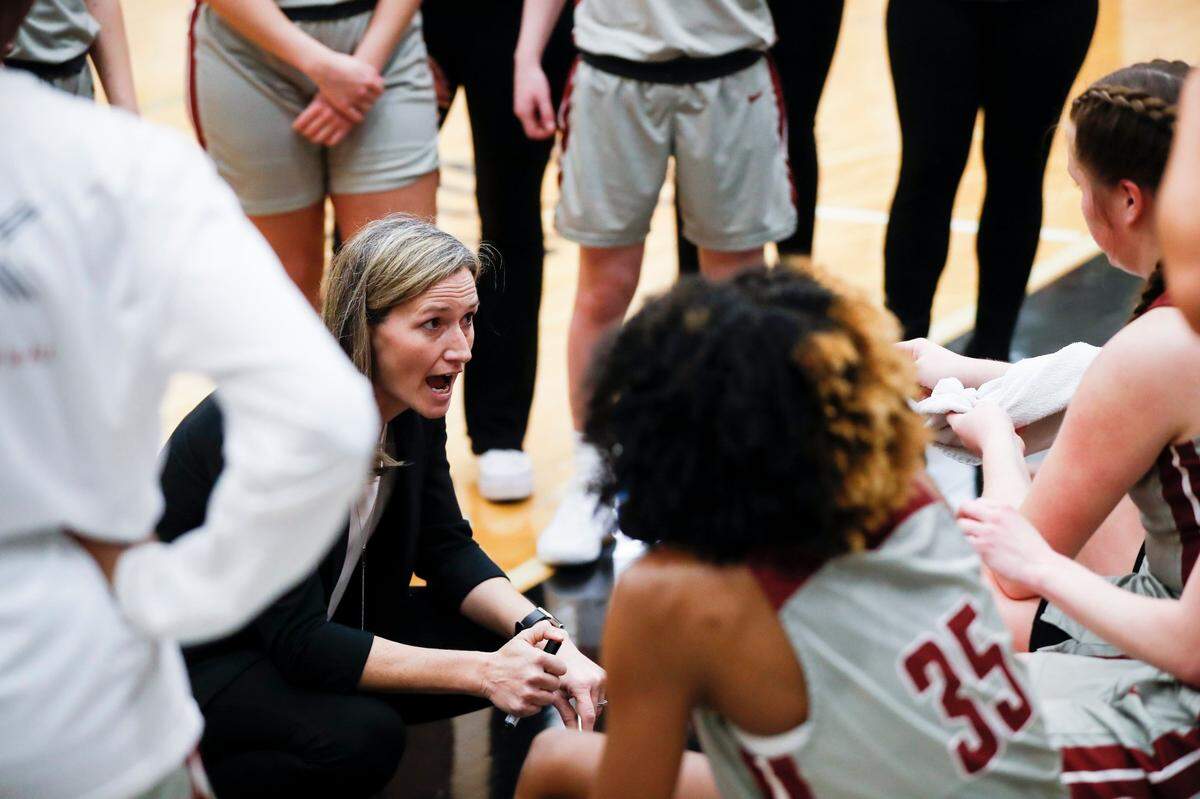 Transylvania head coach Juli Fulks talks with her players during a timeout in their first-round game against Rhodes at the Beck Center. Back-to-back wins this past weekend in Lexington have the Pioneers hosting a Sweet 16 game this Friday.
