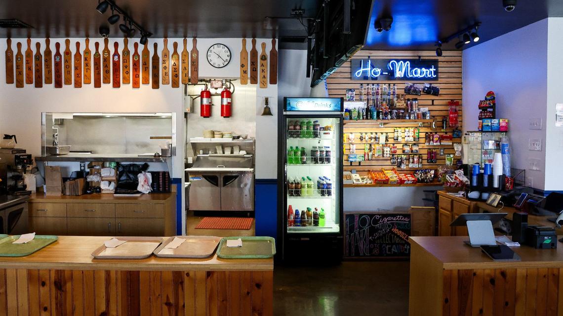 The counter where customers pick up their orders, left, and the Ho-Mart, a convenience store at the new Tolly-Ho location at 350 Foreman Ave.