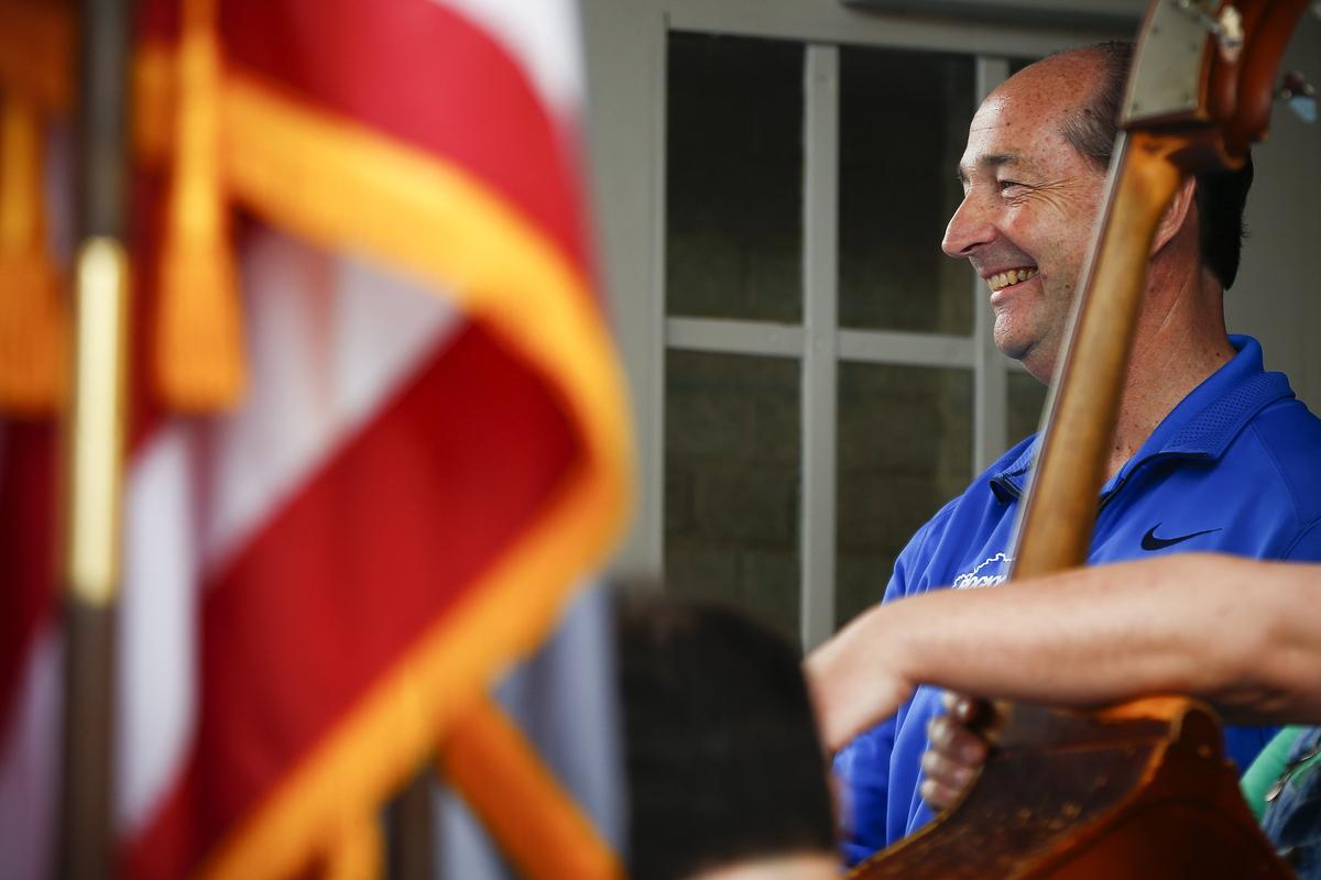 Democratic gubernatorial candidate Rocky Adkins waited on stage before speaking to supporters in front of the Pike County Courthouse during Hillbilly Days Saturday in downtown Pikeville.