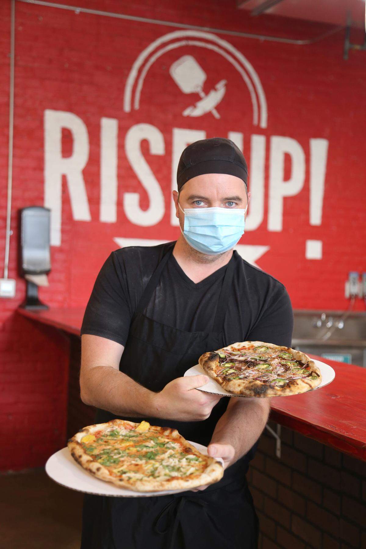 Mattie Evans of Rise Up! Pizza will have two pizzas for Lexington Pizza Week, including one made with neighbor Porterhouse BBQ’s smoked brisket.