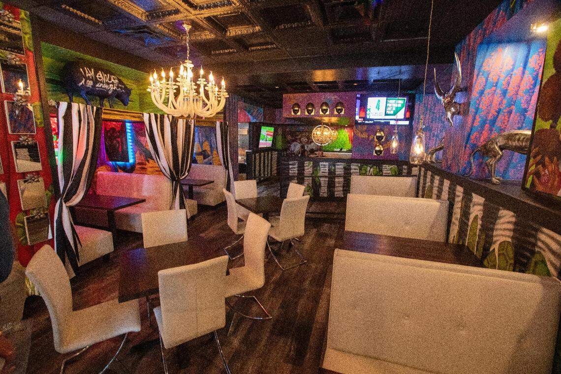 The dining room at Agave & Rye’s new downtown Lexington location on North Broadway has several areas, including the “Love Shack” booths, left.