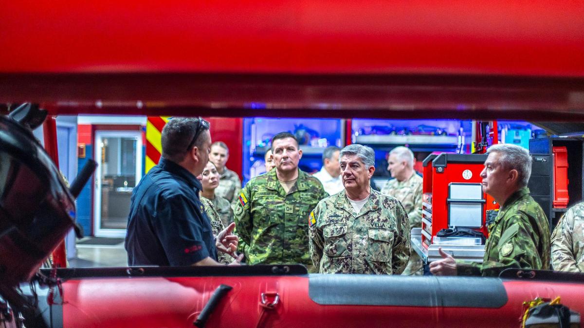 Members of the Armed Forces of Ecuador visit with senior leaders of the Kentucky National Guard, Kentucky Emergency Management and Lexington Fire Department at the Lexington Fire Training Academy in Lexington, Ky., on Thursday, Feb. 1, 2024.