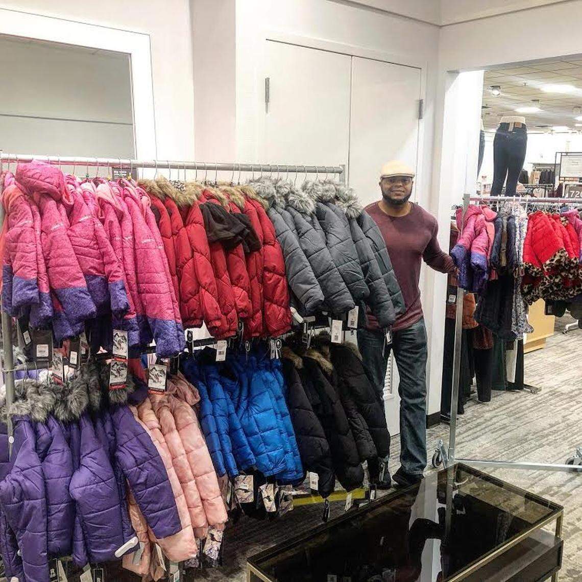Hip-hop artist Devine Carama is collecting new coats for children in need in Central and Eastern Kentucky for the sixth year. He was at Macy’s department store in Lexington buying coats on November 29, 2019.