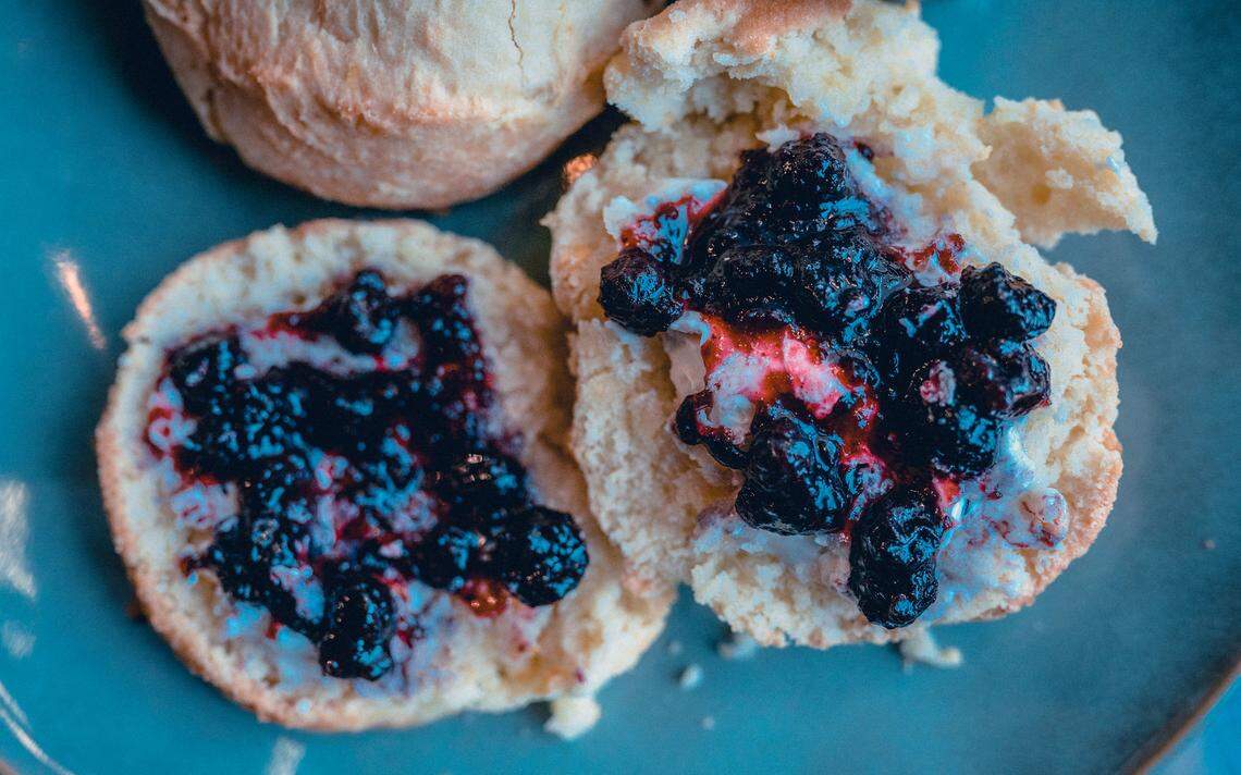 Tupelo Honey Southern Kitchen & Bar is known for its Southern and Appalachian food with a modern twist, including cathead buttermilk biscuits served with blueberry jam.