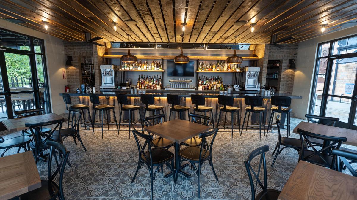 A new building was added to the under-utilized patio; it has a vintage gas staion vibe, with garage doors that can roll up and seating for about 115 inside and out.