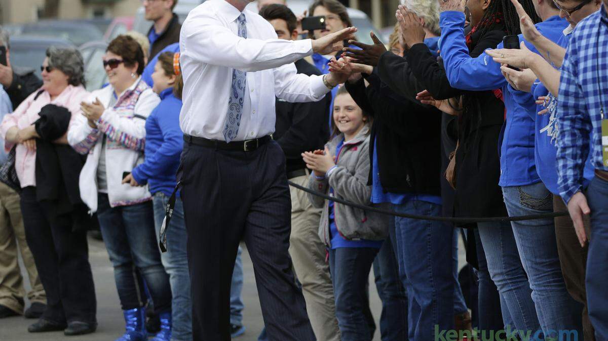 Kentucky Wildcats head coach Matthew Mitchell shook hands with fans during the Cat Walk before the NCAA second-round game at Memorial Coliseum Monday, March 24, 2014 in Lexington, Ky. Photo by Amy Wallot