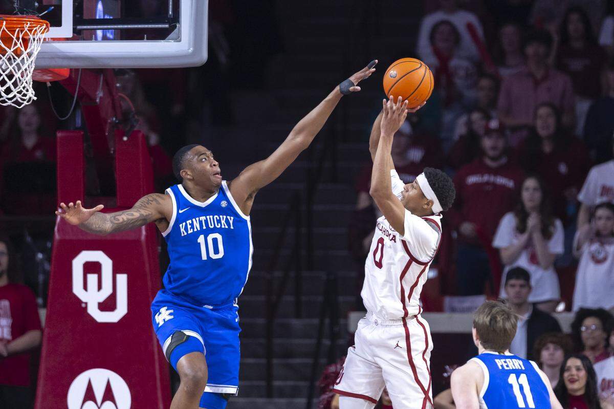 Oklahoma’s Jeremiah Fears (0) shoots as Kentucky’s Brandon Garrison (10) closes in during Wednesday’s game at Lloyd Noble Center in Norman, Okla. Garrison finished with 12 points, four rebounds, three blocks and three steals.