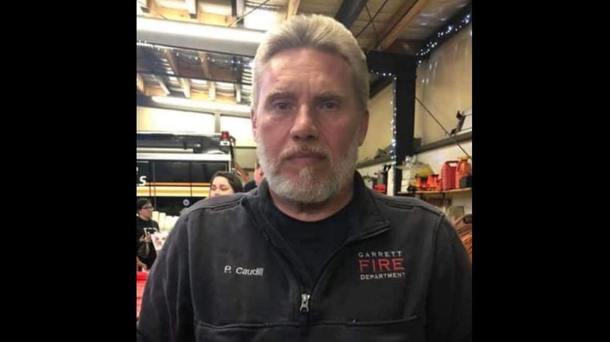 Phillip Caudill, a volunteer firefighter in Floyd County, died after he suffered an apparent heart attack while helping with a graduation parade.