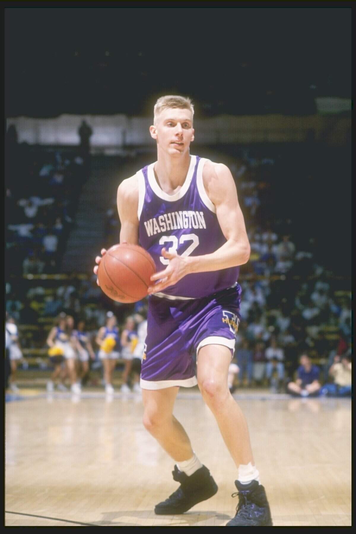 In the two seasons Mark Pope (32) played for Washington (1991-92 and 1992-93), he averaged 11.2 points and 8.1 rebounds. Pope is shown in a March 6, 1993, contest vs. UCLA.