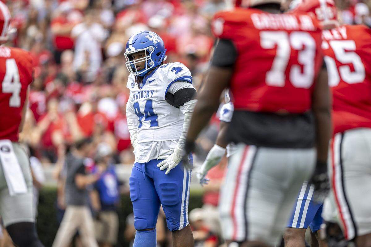 Kentucky’s Tavion Gadson (94) reacts after Georgia scored Saturday at Sanford Stadium in Athens, Ga.