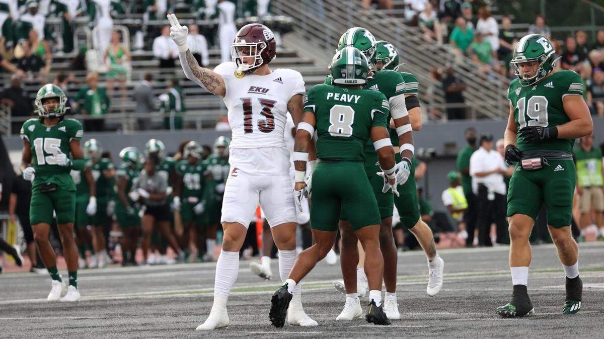 Eastern Kentucky’s Dakota Allen signaled a first down during the Colonels’ season opener at Eastern Michigan on Friday night. Allen caught nine passes for 118 yards and two scores.