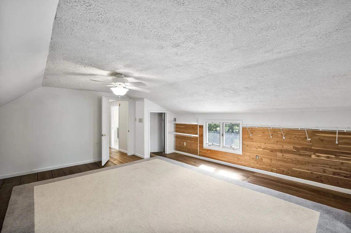 An upstairs bonus room at 315 Heritage Road in Woodford County.