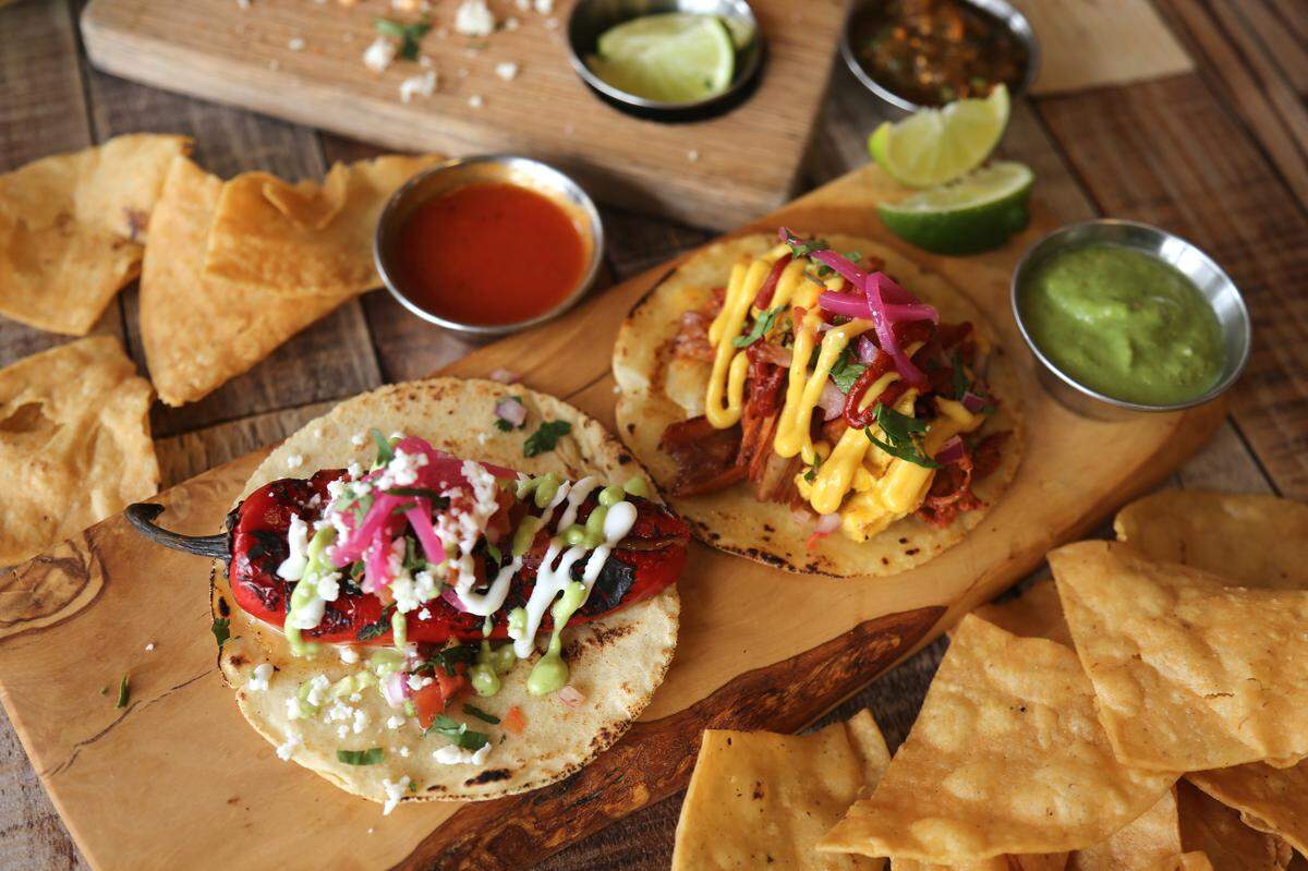 LaTaquiza’s offering for this year’s Crave Taco Week includes a vegetarian chile relleno taco and a zesty pork and pineapple salsa taco. You get two of either for $5.