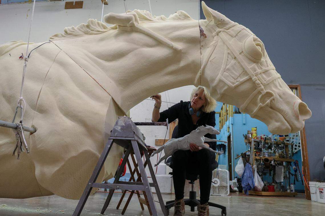 Jocelyn Russell used the maquette sculpture she created as a guide for carving details into the enlarged foam version of the Secretariat monument.