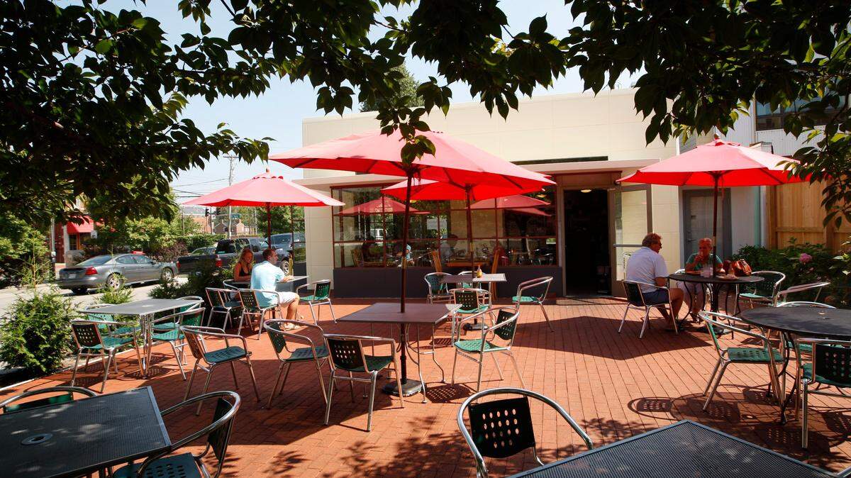 Patio seating featured shade trees and umbrellas at Doodles, which is participating in Dining Out for Life to benefit AVOL.