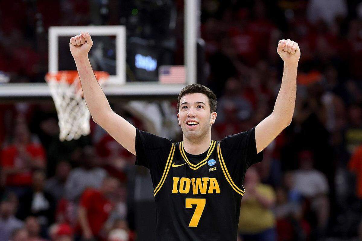HOUSTON, TEXAS - MARCH 26: Alvaro Folgueiras #7 of the Iowa Hawkeyes celebrates against the Nebraska Cornhuskers in the Sweet Sixteen of the 2026 NCAA Men's Basketball Tournament at Toyota Center on March 26, 2026 in Houston, Texas. (Photo by Alex Slitz/Getty Images)