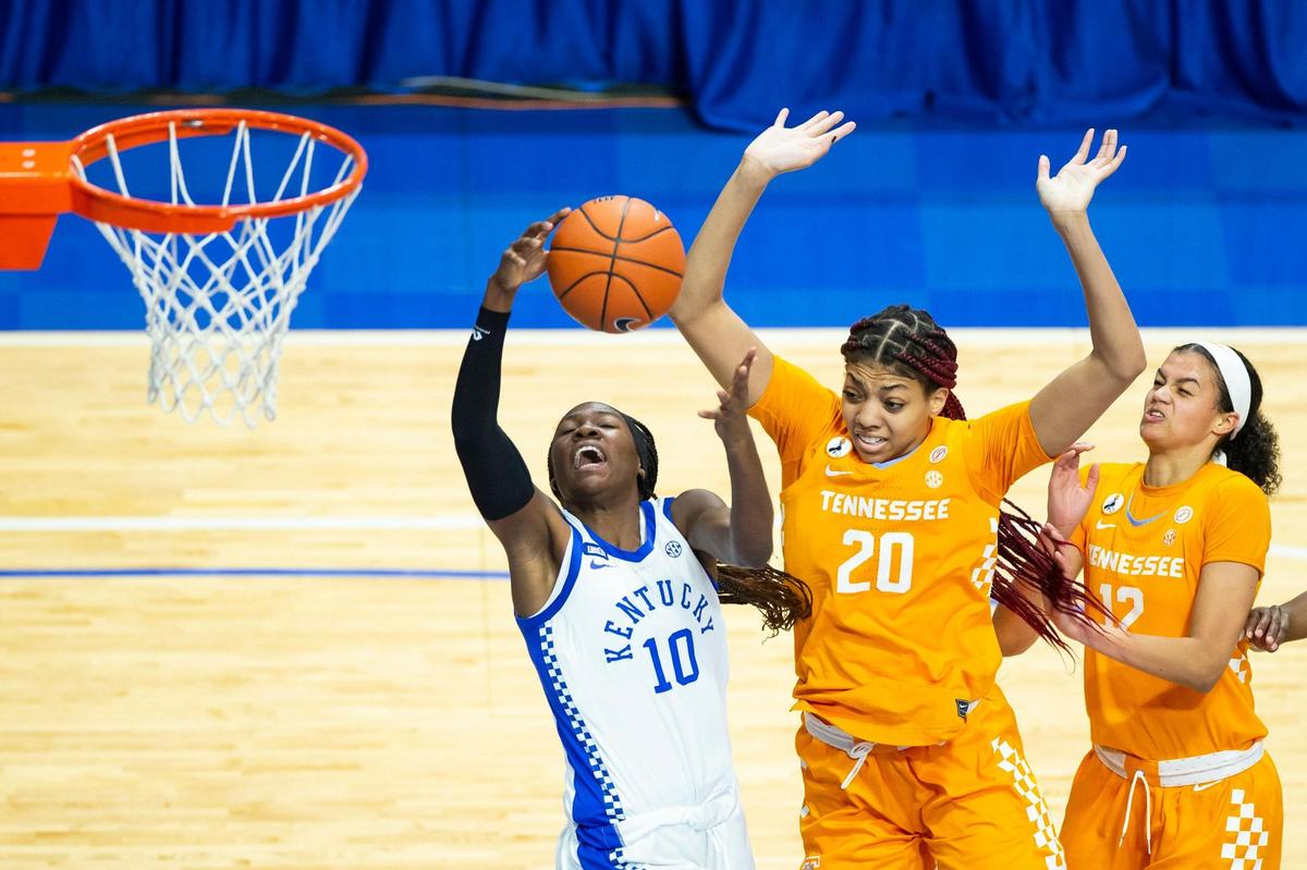Kentucky guard Rhyne Howard (10) grabbed one of her four first-half rebounds during the Wildcats’ game against Tennessee in Rupp Arena on Thursday night. Howard finished with eight points, seven rebounds, six assists and seven steals.