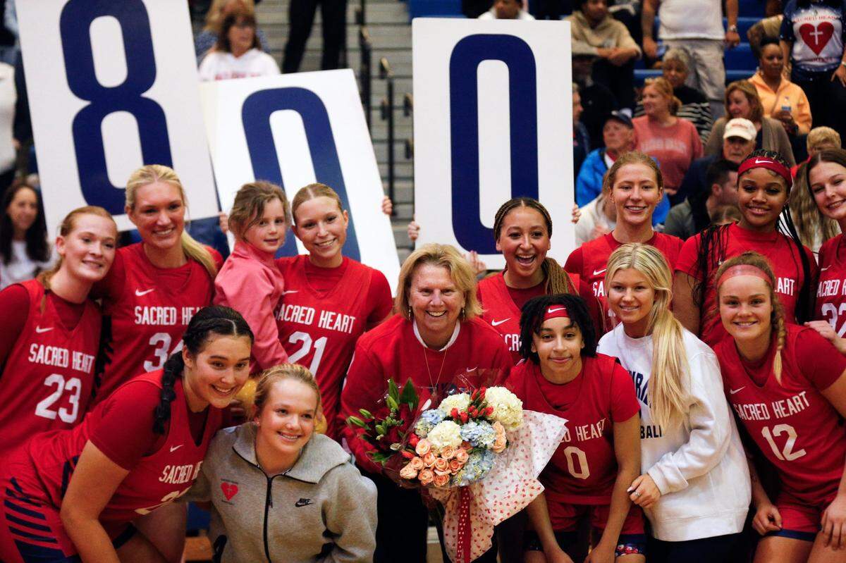 Sacred Heart celebrates head coach Donna Moir getting her 800th career win after the Valkyries’ 7th Region championship game victory over Manual. Sacred Heart will attempt to win its fourth consecutive state championship this week, opening play Thursday against 10th Region champion George Rogers Clark.