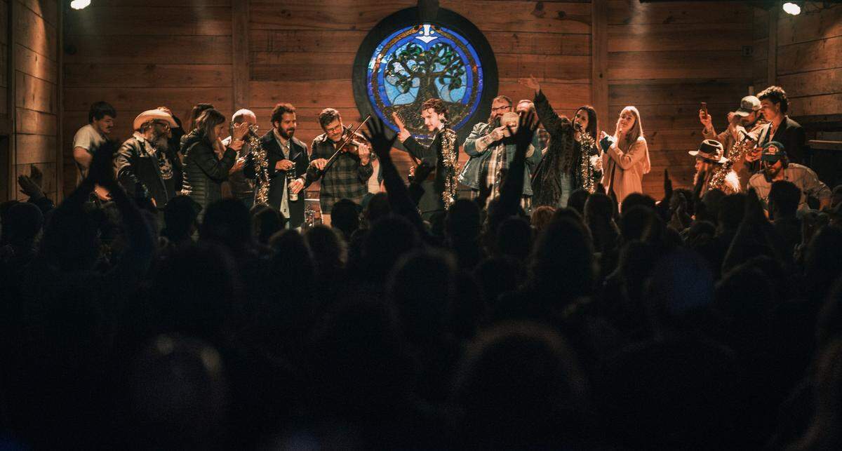 At the December 2023 John Prine tribute at The Burl, performers gathered on stage to sing “Paradise” at the end of the concert.