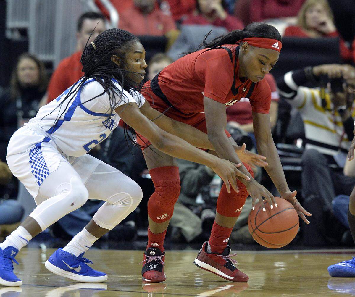 Louisville guard Dana Evans, right, will try to lead the Cardinals to a fifth straight victory over archrival Kentucky in 2020-21 — if there is a college basketball season.