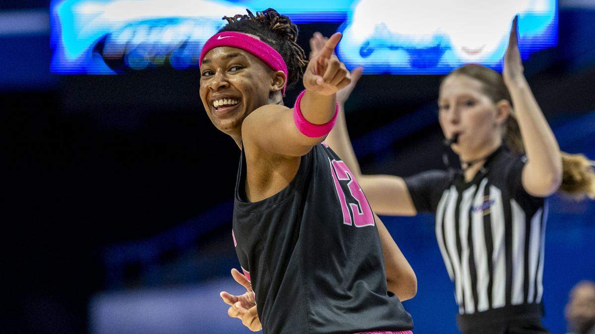 Assumption's Ashlinn James (13) celebrates after making a three-pointer during the Rocket's 72-35 win over Calloway County in a first-round game against Calloway County in the 2026 Clark's Pump-N-Shop Girls' Basketball Sweet 16, Wednesday, March 11, 2026 at Rupp Arena in Lexington, Ky.