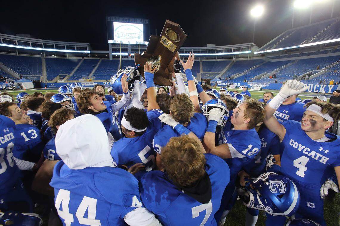 Covington Catholic players celebrate their win in the Class 5A UK Orthopaedics/KHSAA Gridiron Bowl State Championship at Kroger Field Saturday, Dec. 7, 2019.