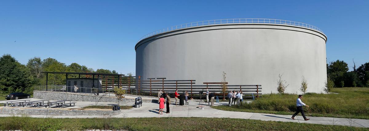 An official opening ceremony was held Tuesday morning for a new rest area built for pedestrians and cyclists around the new wet weather storage tank on the Legacy Trail in Coldstream Park. The new rest area includes restrooms ( located under the roof on the left), a water bottle filling station, bike racks and seating along with trees and landscaping that provide shade The wet weather storage tank is 60 feet tall and can hold 11 million gallons of water.